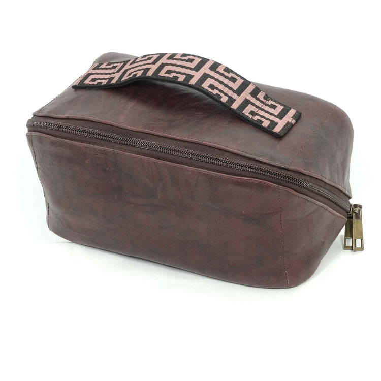 Guatemalan leather toiletry bag in a merlot color