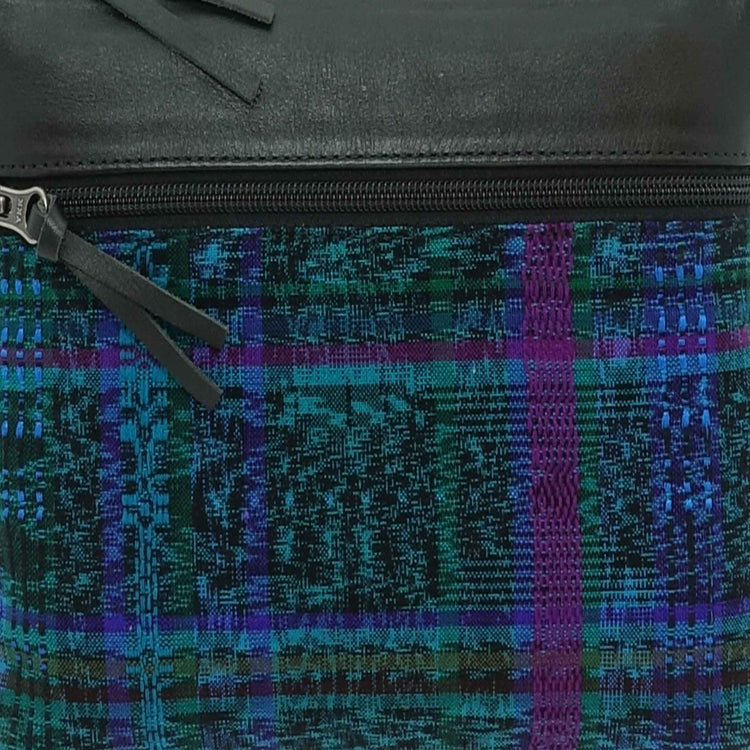 Close-up of a blue, green and purple plaid fabric