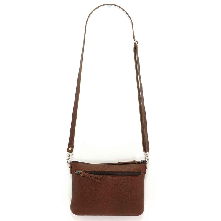 Brown leather crossbody, back view with strap