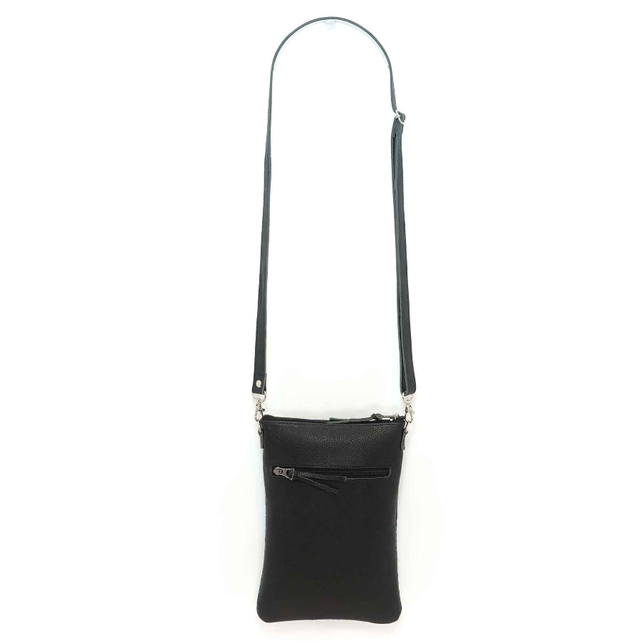 Artisan crafted black leather crossbody bag on a white background