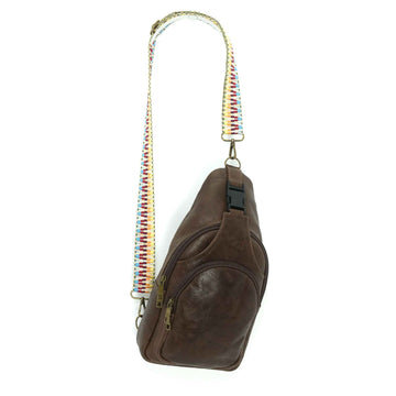 Artisanal leather sling bag in carob brown, front view; made in Guatemala