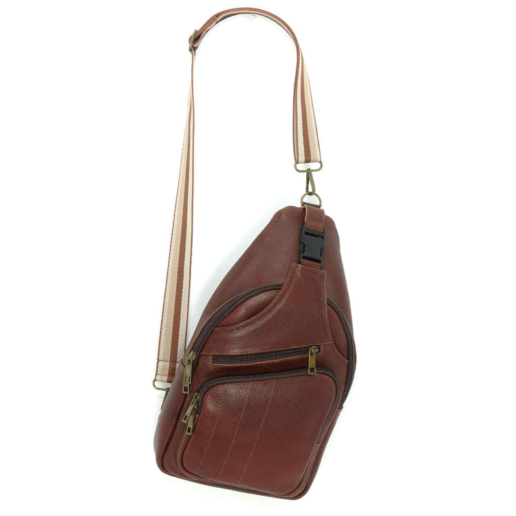Artisanal leather sling bag in a chesnut brown.  Made in Guatemala