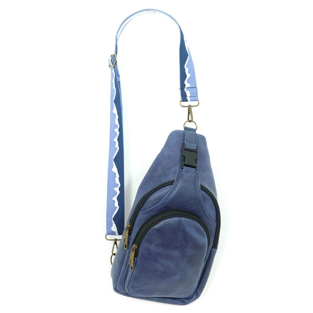 Artisanal leather sling bag in a cobalt blue
