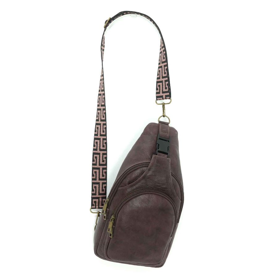 Artisanal leather sling bag in a merlot color, front view.  Made in Guatemala