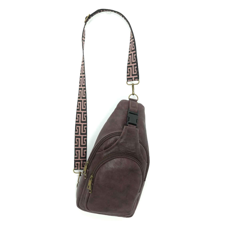 Artisanal leather sling bag in a merlot color, front view.  Made in Guatemala