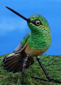 Ceramic figurine of a Buff-Bellied Hummingbird, front view