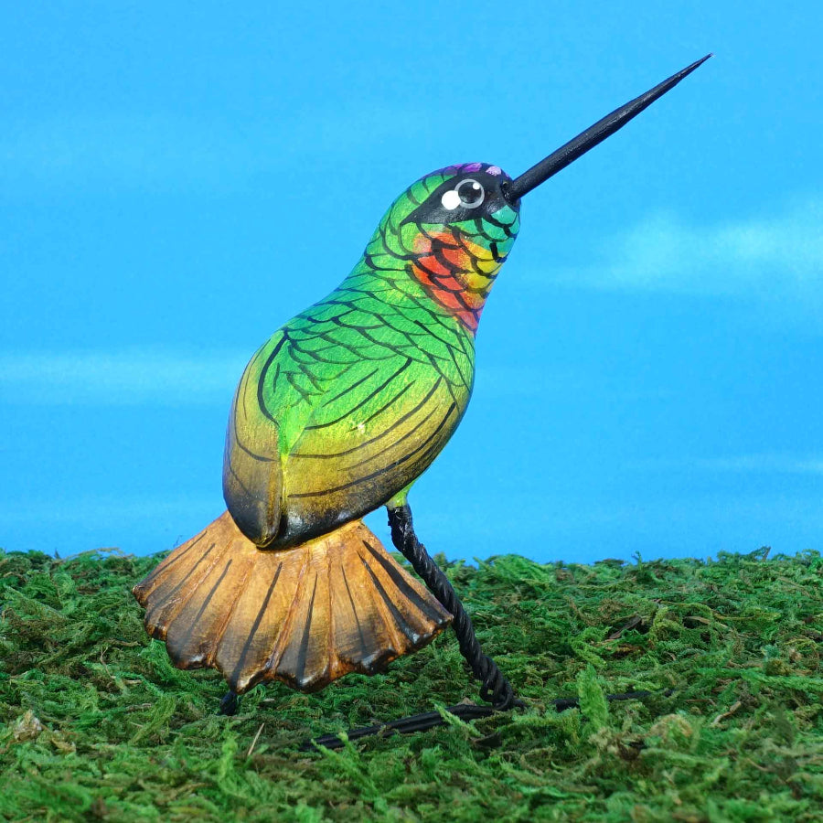 Ceramic figurine of a Gould's Jewelfront Hummingbird, back view