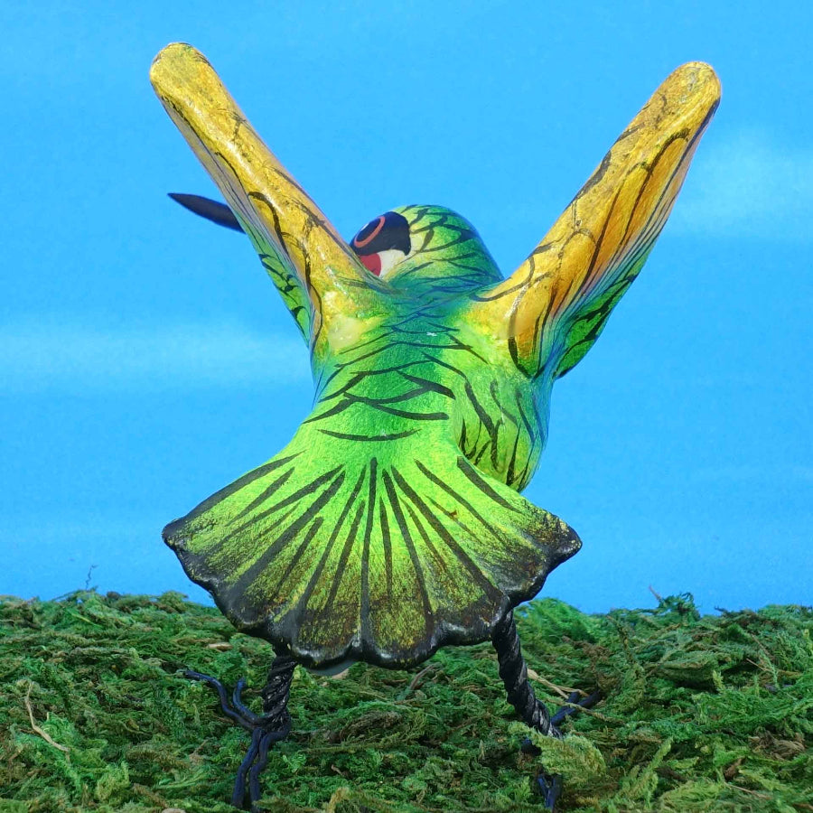 Ceramic figurine of a Ruby-Throated Hummingbird, back view