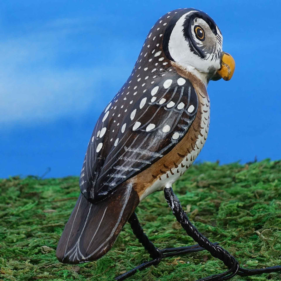 Ceramic Northern Hawk Owl figurine, back view