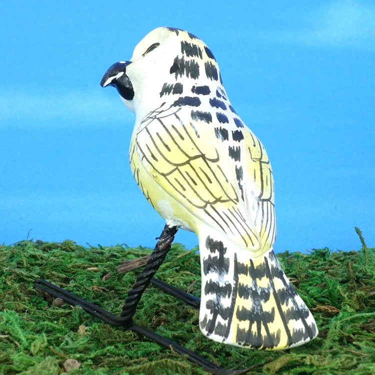 Small ceramic Snowy Owl figurine, back view