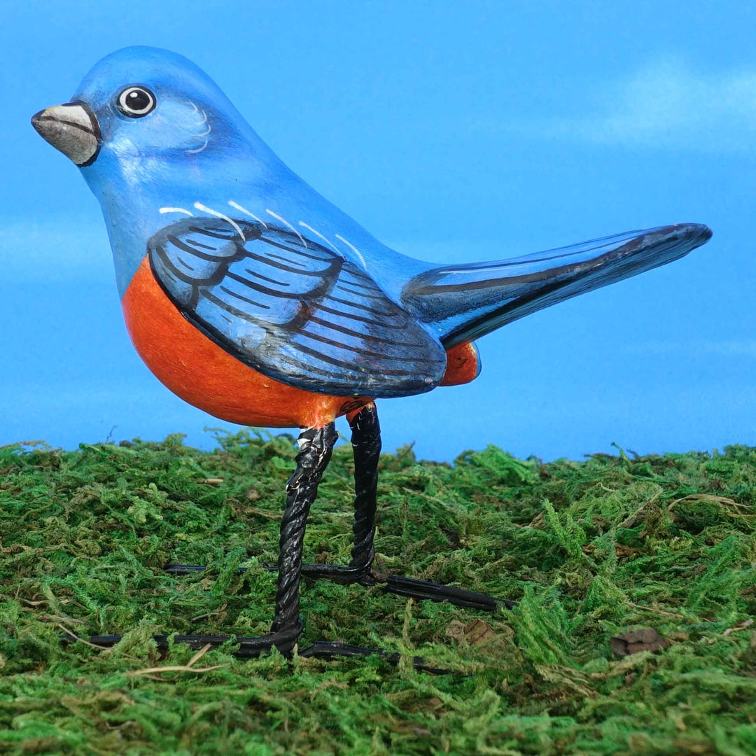 Chestnut bellied thrush ceramic figurine, side view