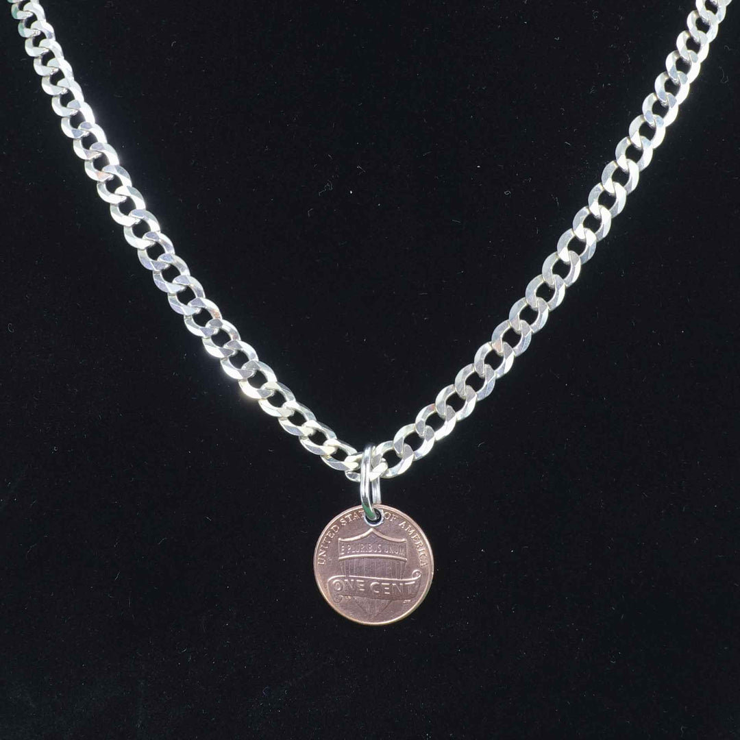 Cuban style sterling silver chain with a penny pendant