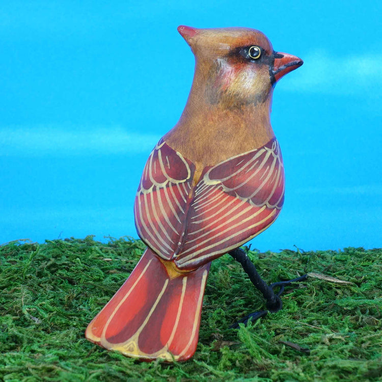 Female cardinal ceramic figurine, back view