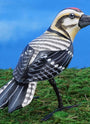 Ladder-backed woodpecker ceramic figurine, back view