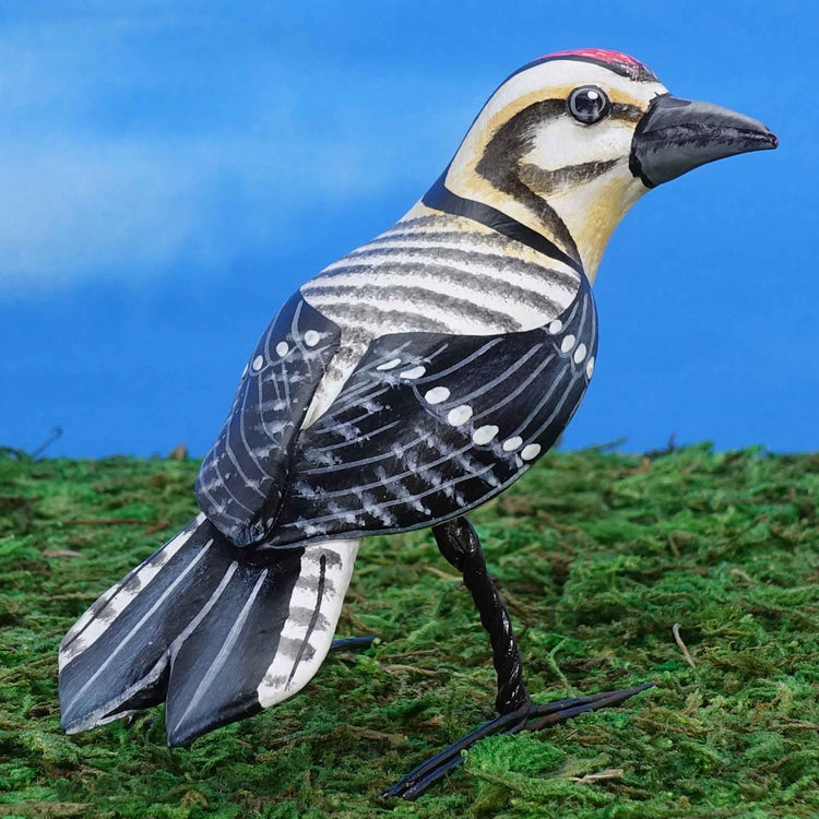 Ladder-backed woodpecker ceramic figurine, back view