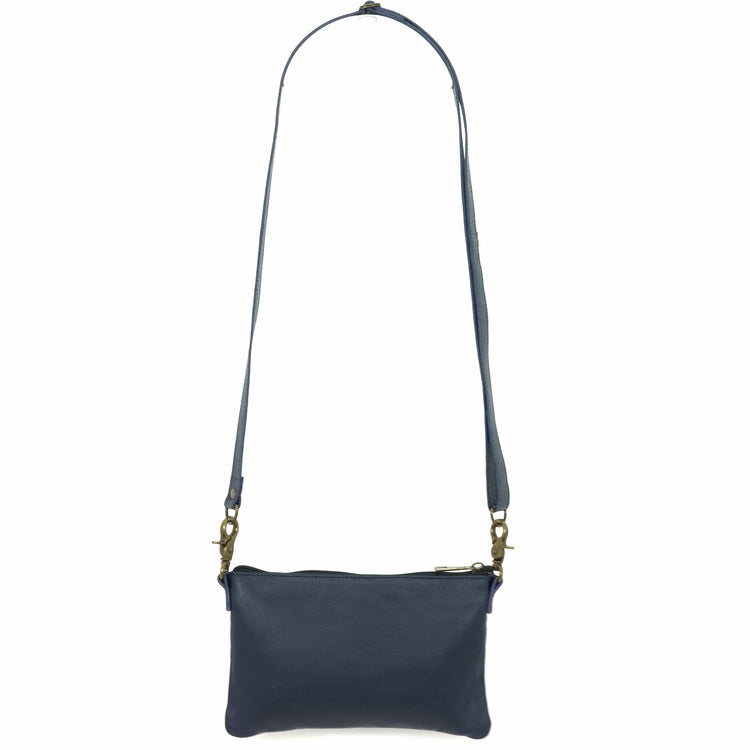 Handcrafted crossbody bag in an indigo blue, back view