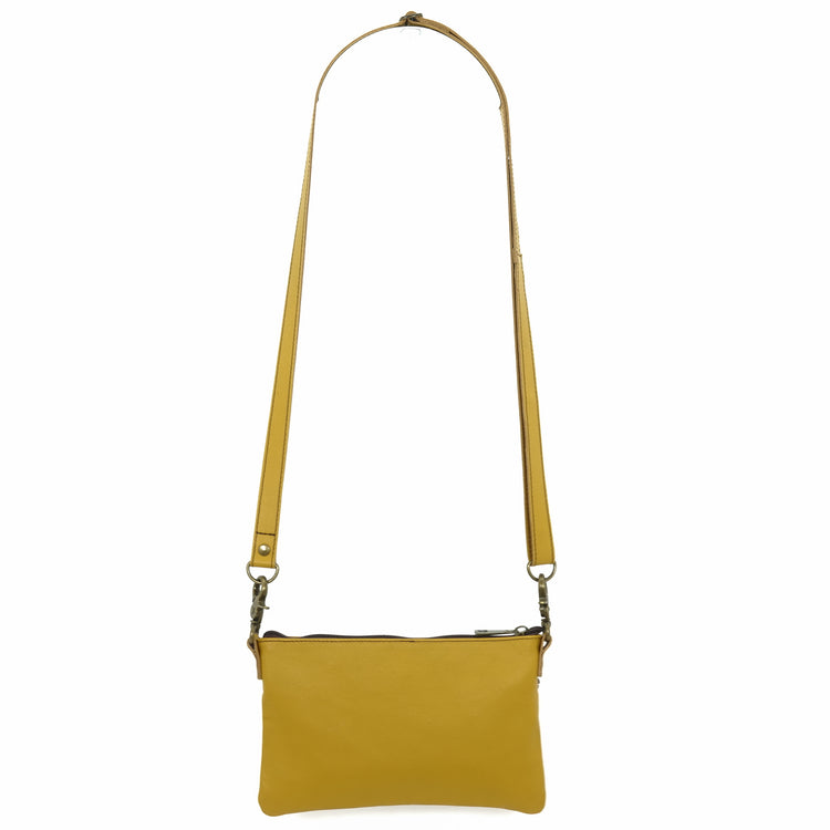Handcrafted crossbody bag in a saffron yellow, back view