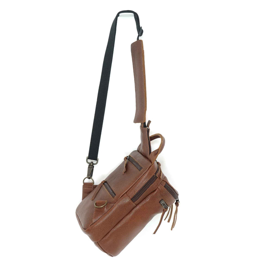 Handmade chest pack in a cinnamon brown, side view