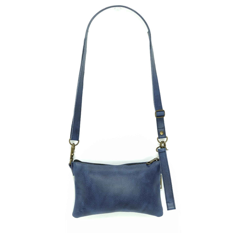 Handmade leather belt bag in a cobalt blue, back view