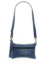 Handmade leather belt bag in a cobalt blue on a white background