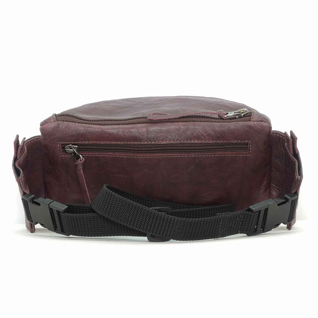 Handmade leather waist bag in merlot- back view, crafted in Guatemala