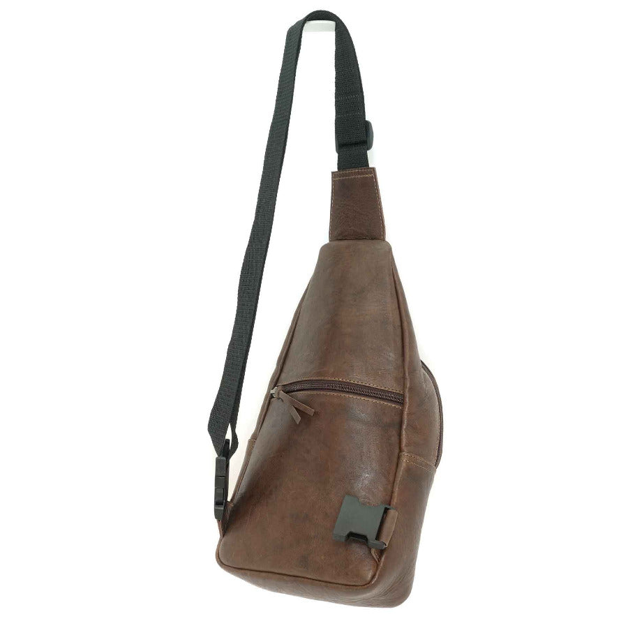 Leather sling bag in carob brown and black, back view.  Crafted in Guatemala