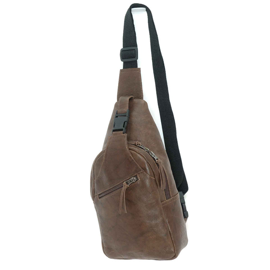 Leather sling bag in carob brown and black, front view.  Crafted in Guatemala