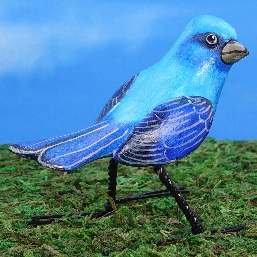 Mountain bluebird ceramic figurine, back view