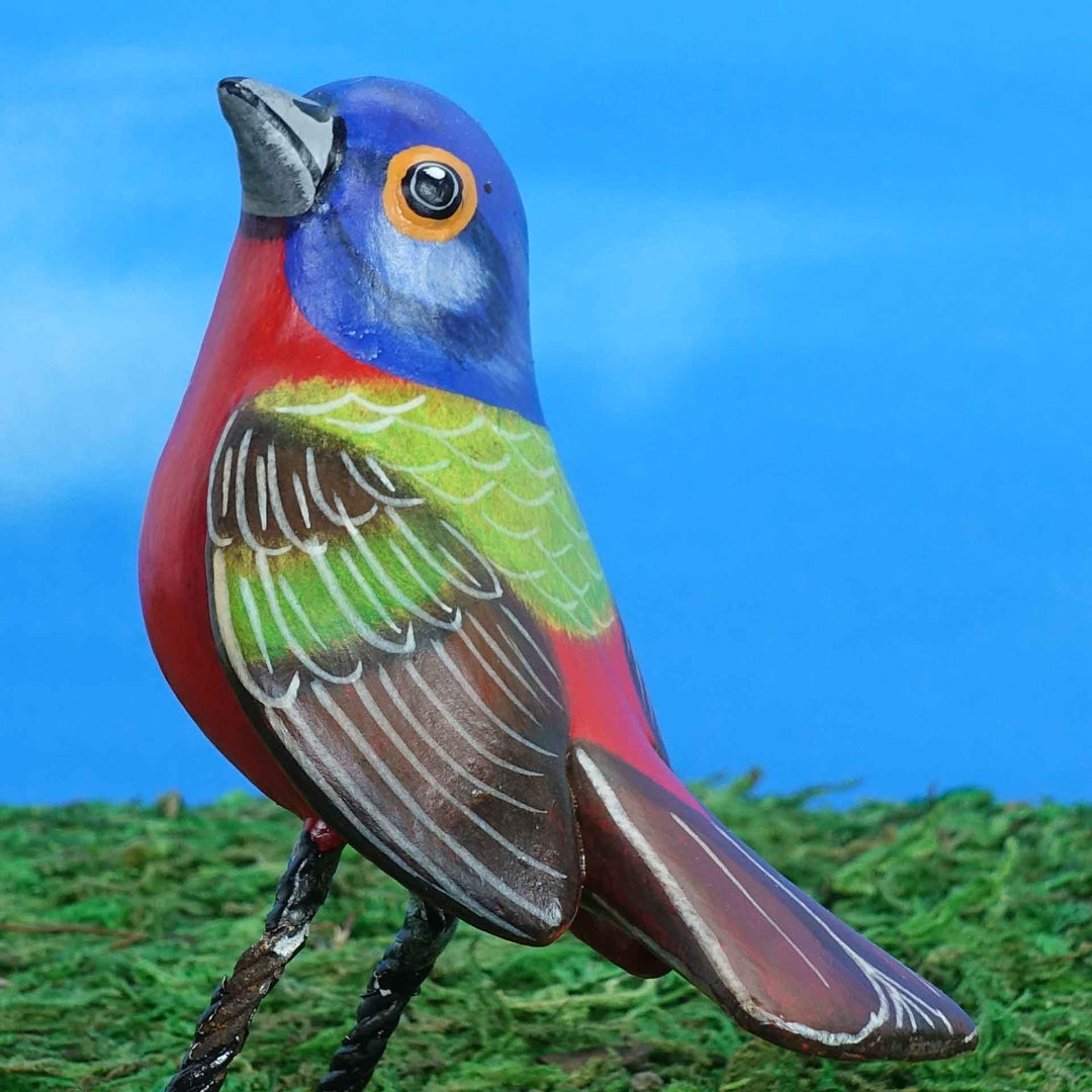 Painted bunting ceramic figurine