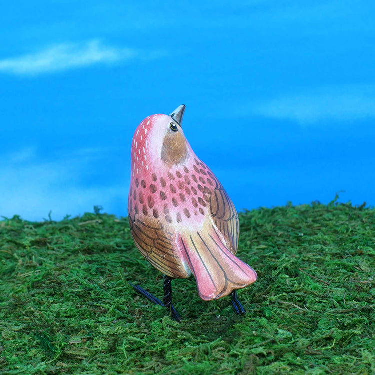 Purple finch ceramic figurine, back view
