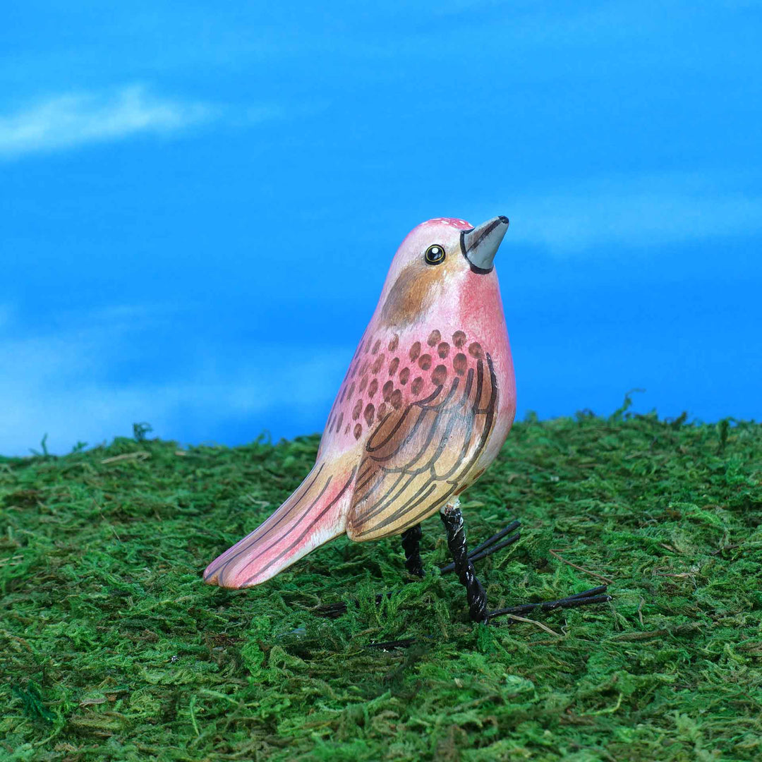 Purple finch ceramic figurine