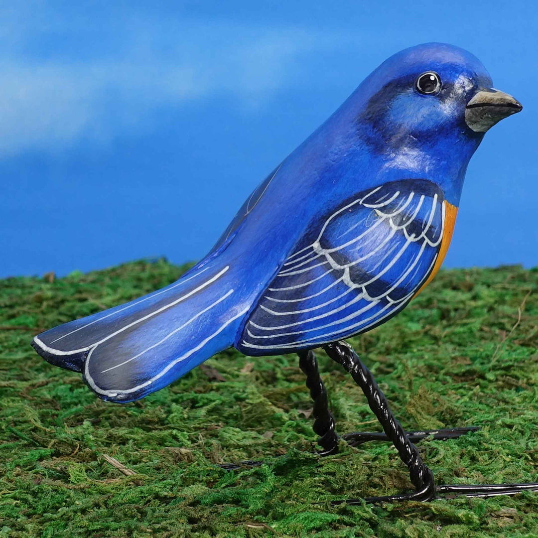 Western bluebird ceramic figurine, back view
