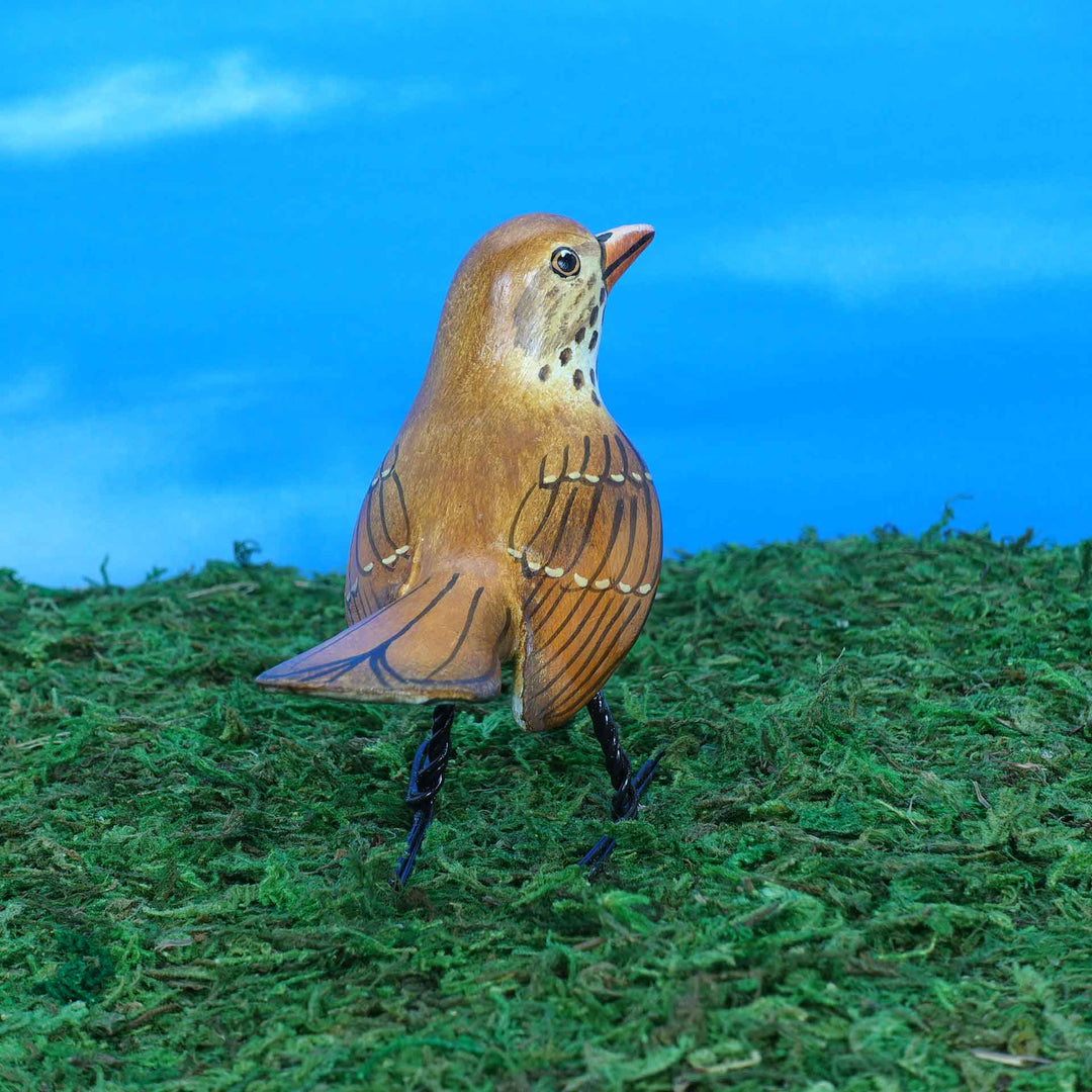 Wood thrush ceramic figurine, back view